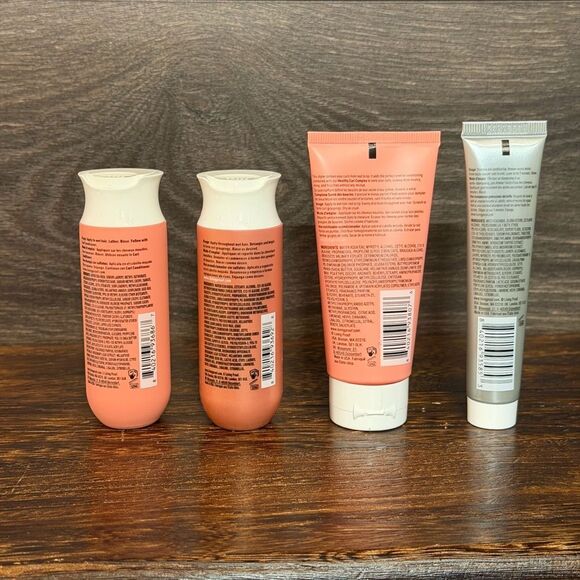 Living Proof Curly Hair Essentials travel-size set, four mini products plus bag - Picture 2 of 11
